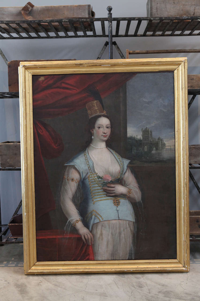 A fantastic painting from a collector outside of Milan. For its age an extremely risqué painting for it's era with her right breast exposed and a single rose in her hand.  in it's original water gilt frame.