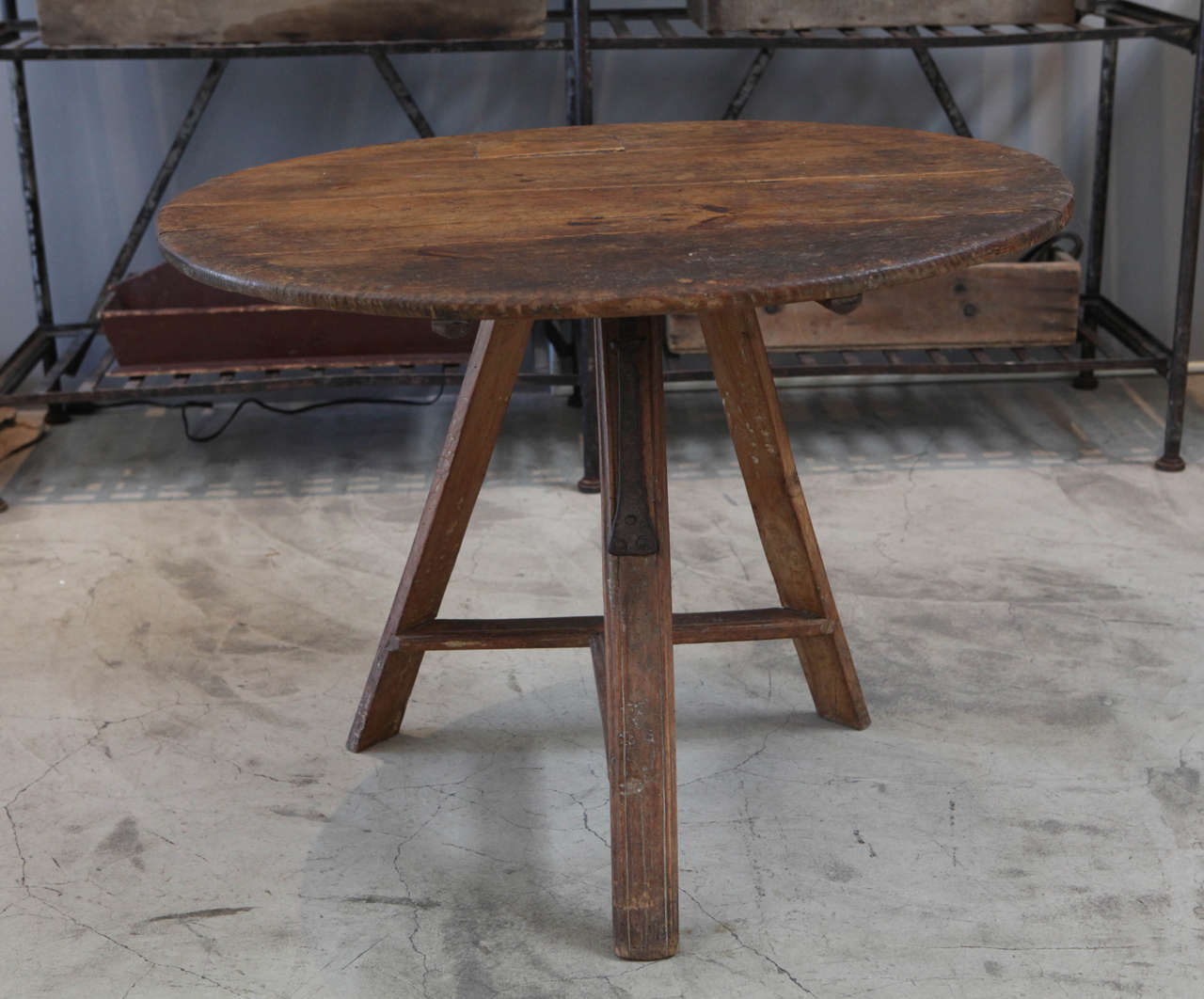 A primitive walnut table from Sweden, completely sturdied and useable as either a side or entry.