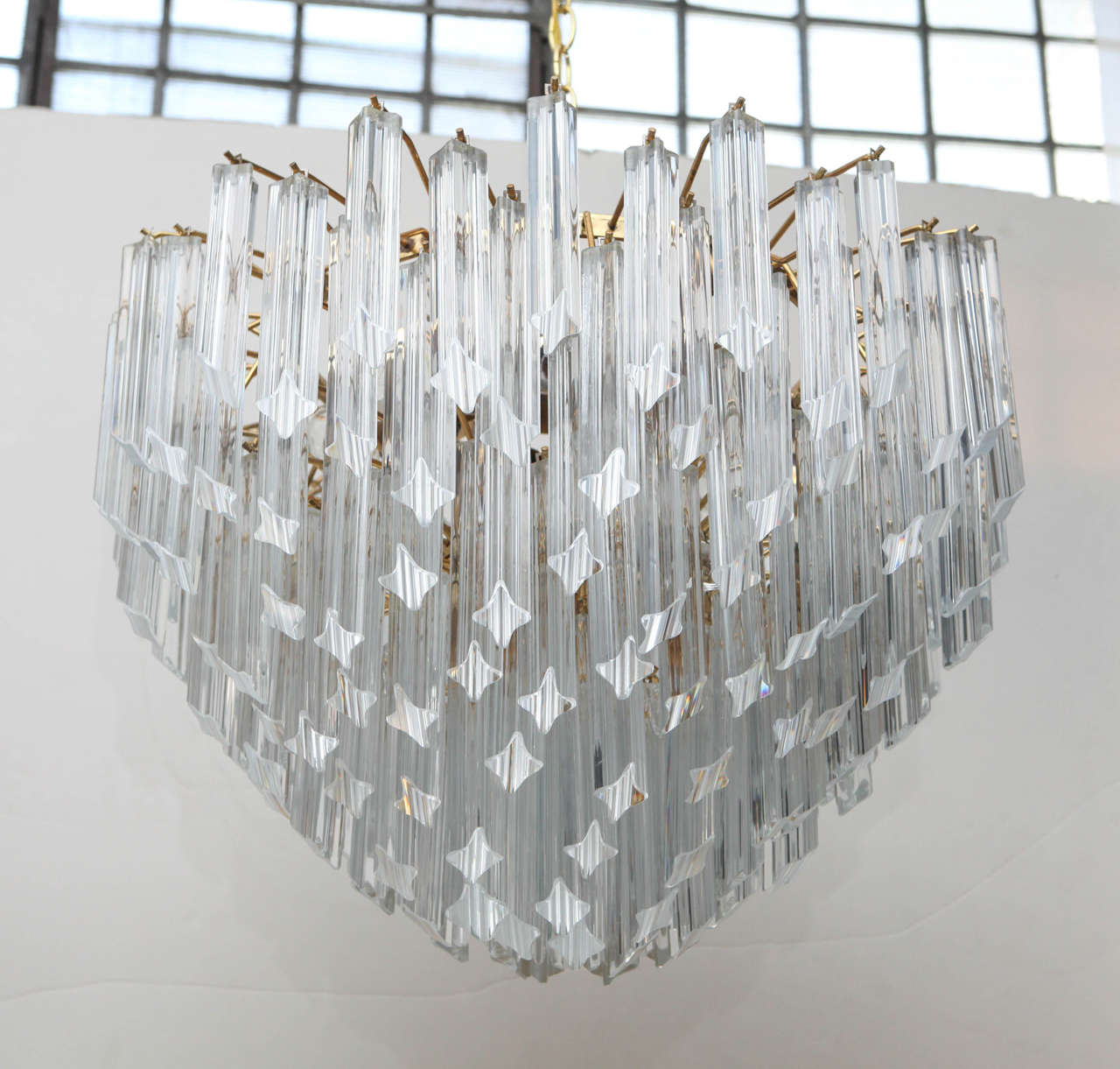 172 handblown vintage Venini Murano bullet prisms create this stunning and sophisticated chandelier.