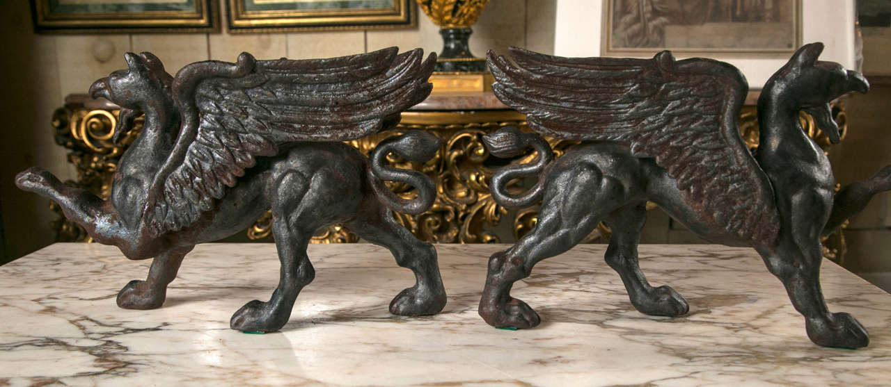 20th Century Pair of Cast Iron Griffins
