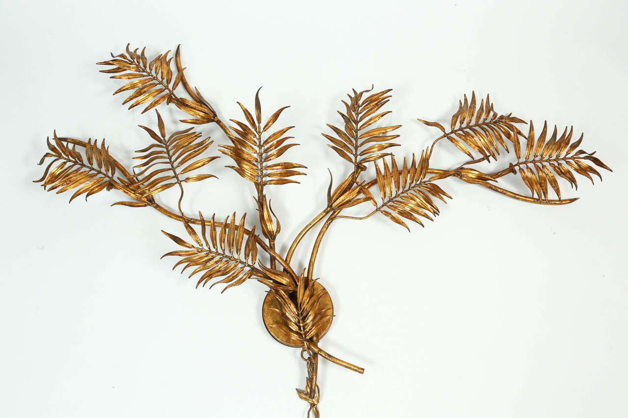 Midcentury gold palm leaf wall light. With plug, or can be hard-wired to wall.