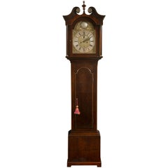 Orologio a cassa alta in mogano