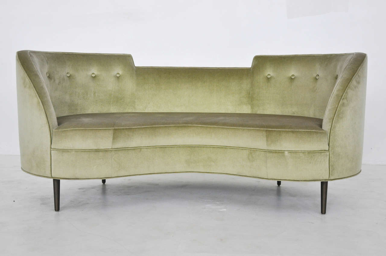 Oasis settee by Edward Wormley for Dunbar. Original green velvet over bronze finish legs.  Later production circa 1980's.