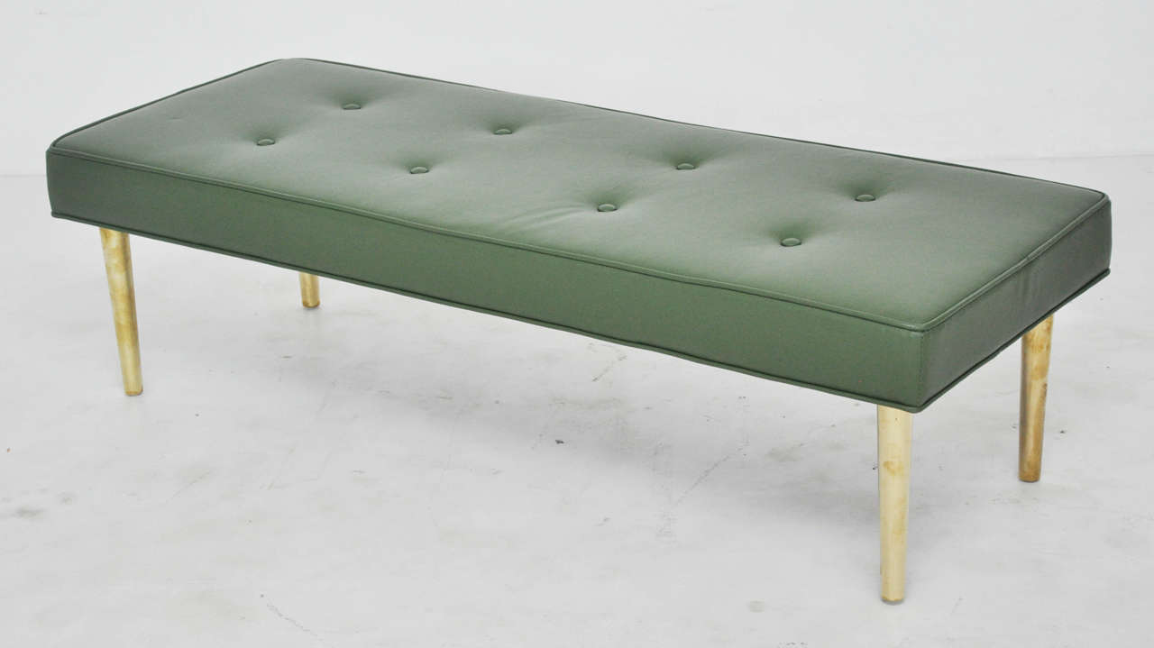 Low Dunbar bench on brass legs by Edward Wormley. New leather upholstery.