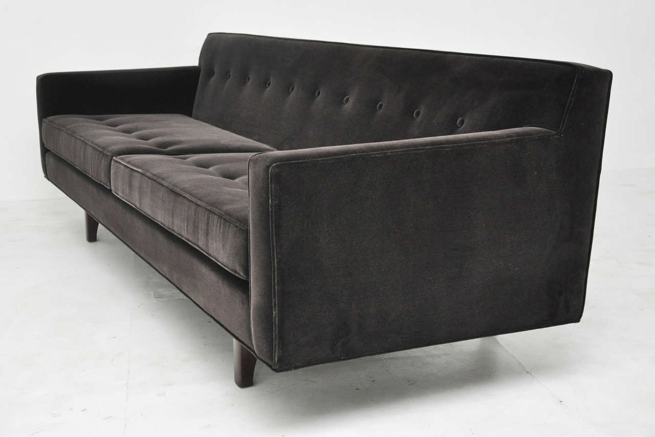 Bracket back sofa by Edward Wormley for Dunbar.  Fully restored. Newly upholstered in plush charcoal velvet with refinished bases.
