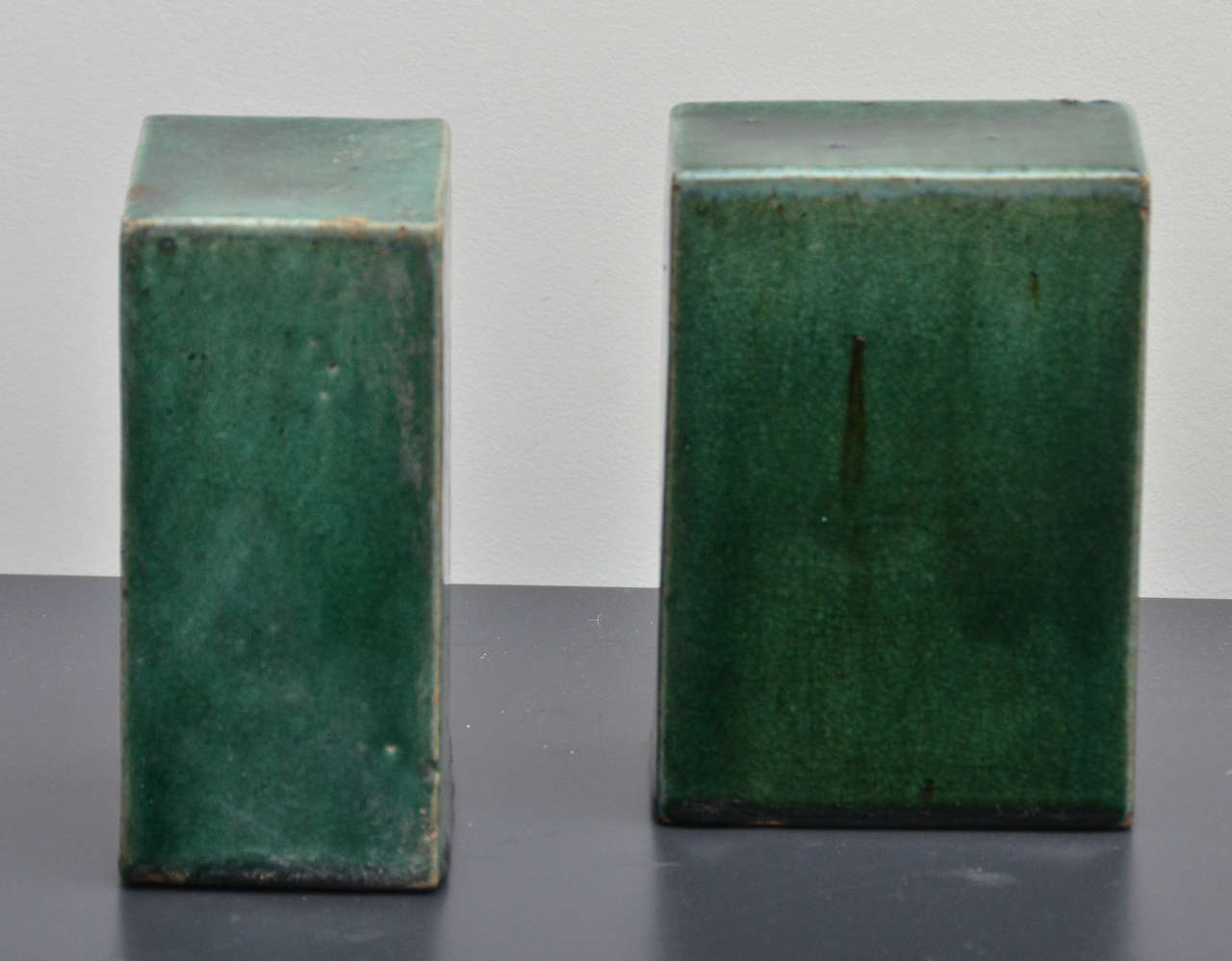 Unknown Pair of Emerald Green Glazed Ceramic Objects