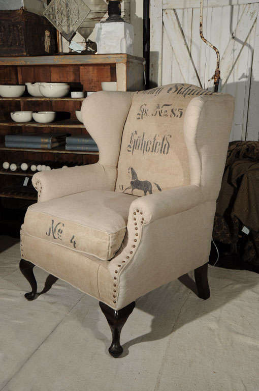 Wing Chair frame is from the mid-1800's. It has been recently recovered in linen and vintage European grain sack material.