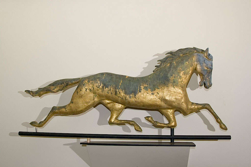 A large size Col. Patchen Full bodied running horse weathervane with an exceptional 19th c. verdigris gilt surface and cast zinc head