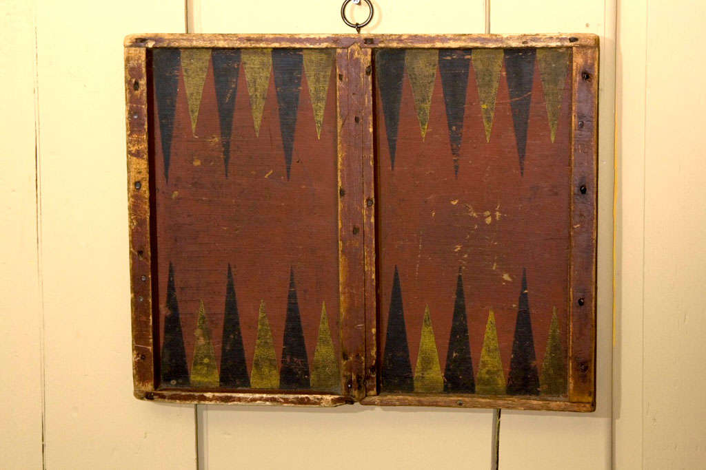 A 19th Century painted two sided game board, with original paint, square nailed and retains a nice dry surface.  Backgammon with the reverse side a Checkers board.