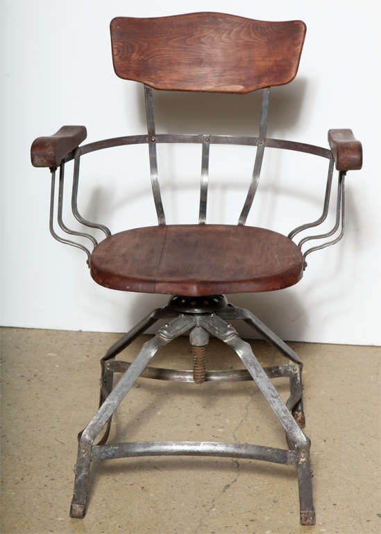 Brunswick swivel Arm Chair