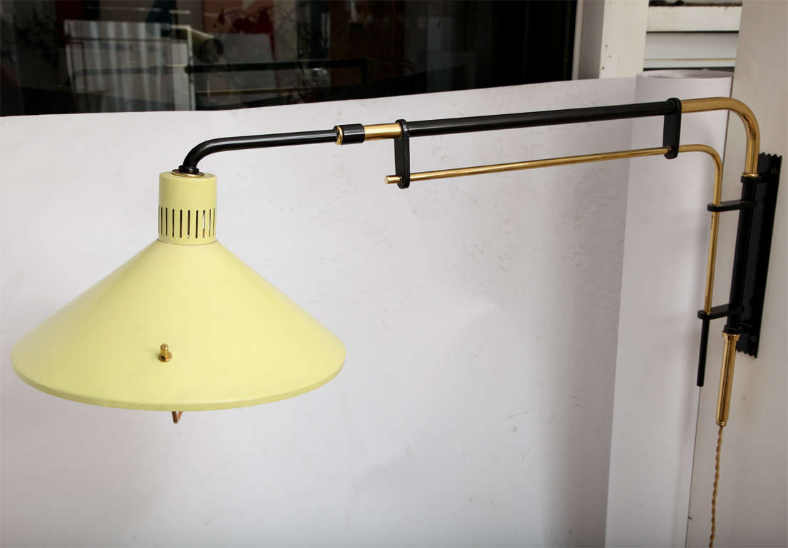 A 1950's Italian Articulated Wall Sconce signed Stilnovo