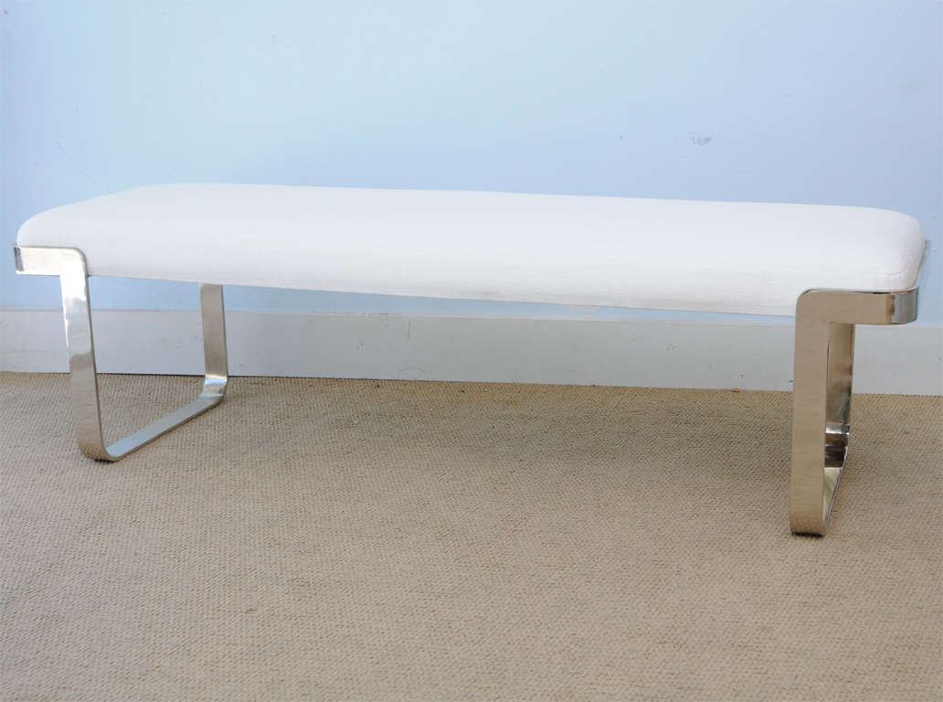 Beautifull Milo Baughman bench with metal legs in plated fin . Wood foam upholstered seat cushion in a white linen blend or provide us with your choice of fabric 2.5 yds . These benches have been completely refurbished .