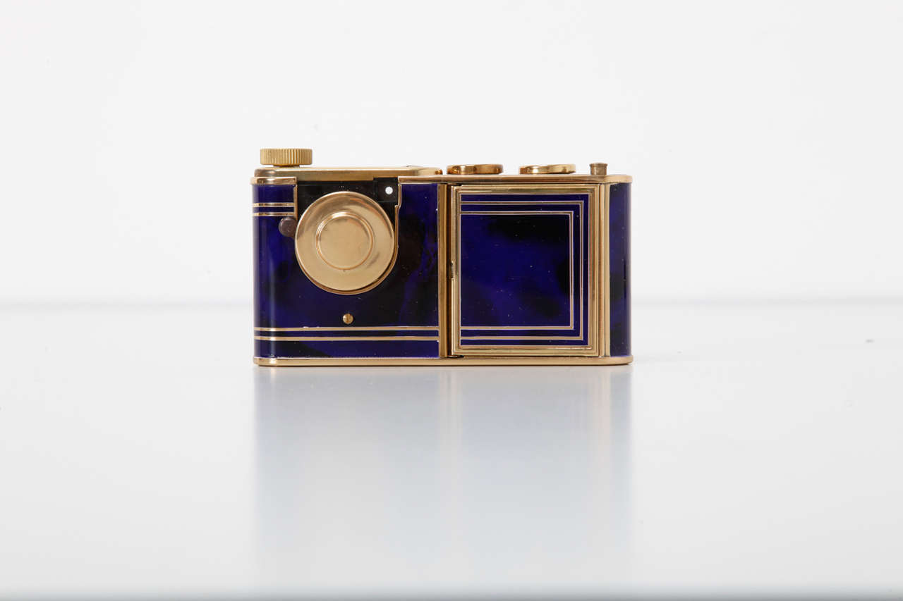c1956. 16mm film, sub-miniature camera for 14x14 exposures. Camera inserted into a 