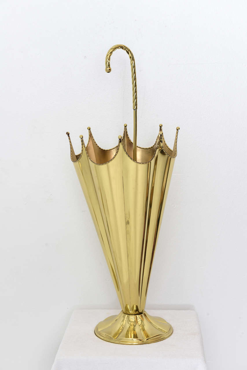 Mid Century brass umbrella stand professionally polished. 
Reduced from $950.00.

Please contact us directly for a shipping quote or any additional information by clicking 