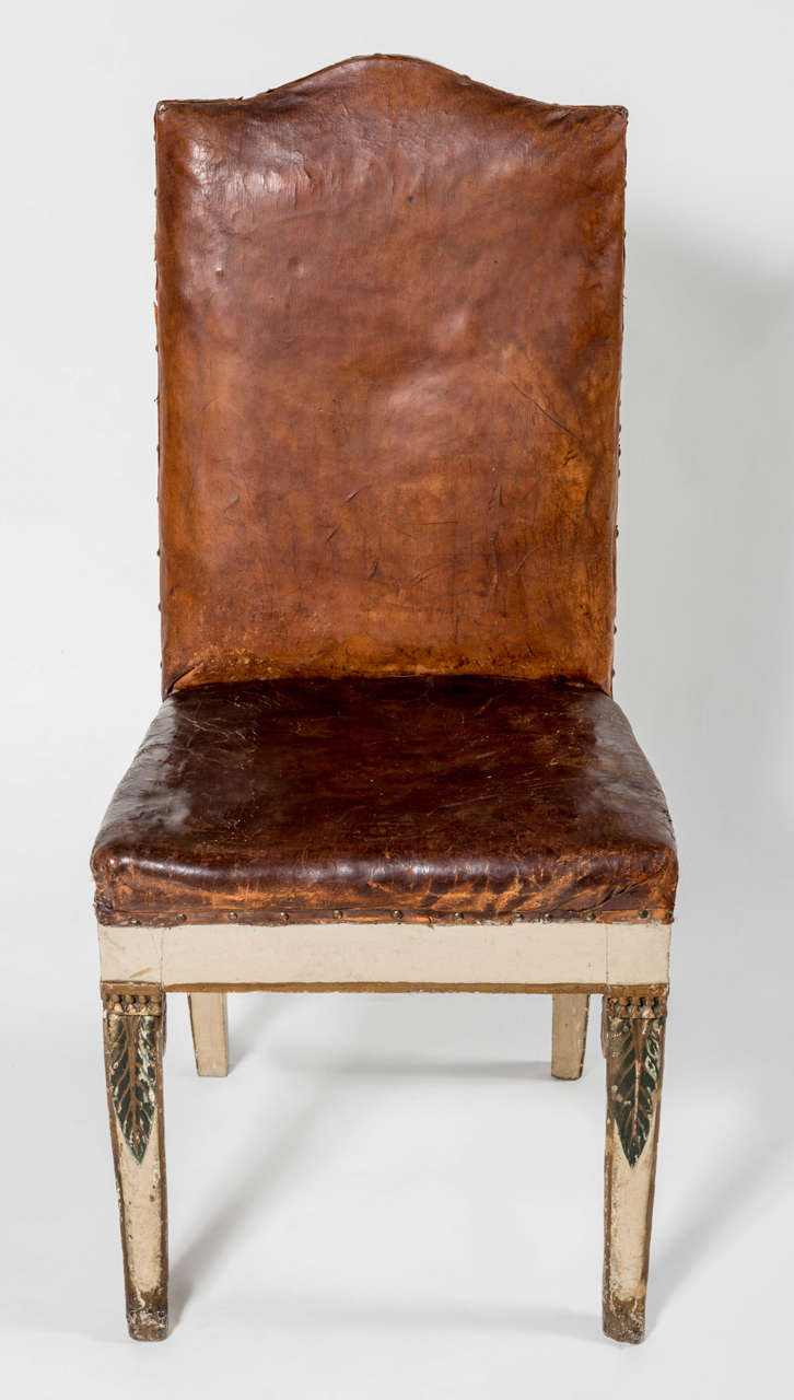 Rare Empire desk or side chair, with original leather and carved,painted and gilded legs.