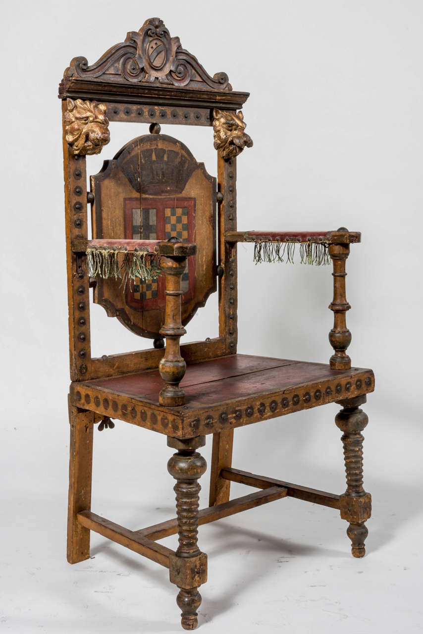 18Th Century rare wood theatre throne,with decorated family crest and carved , gilded lions.