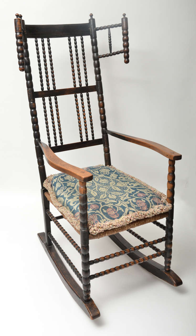 Rocking Chair of Ebonized Rush and Rush Seat Attributed to Ernest Gimson