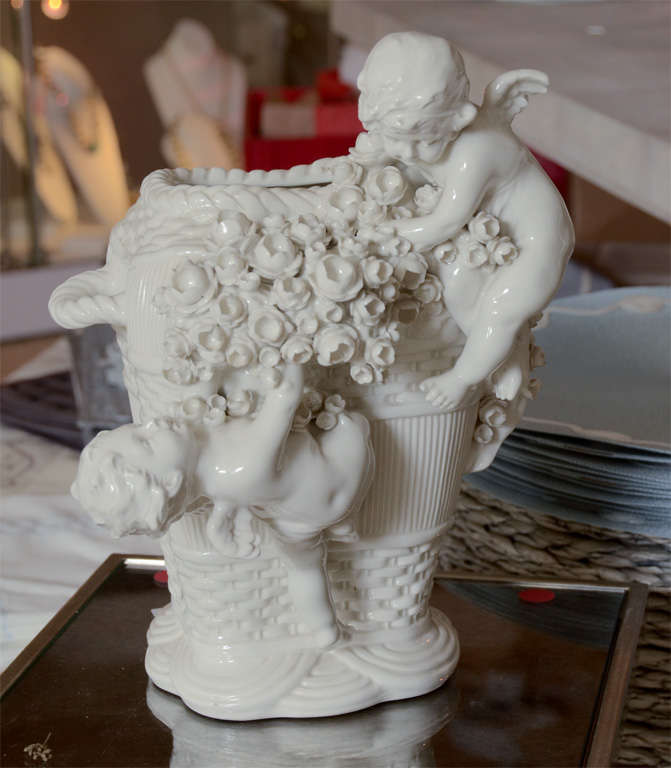 Beautifully made white bisque Putti figural group vase