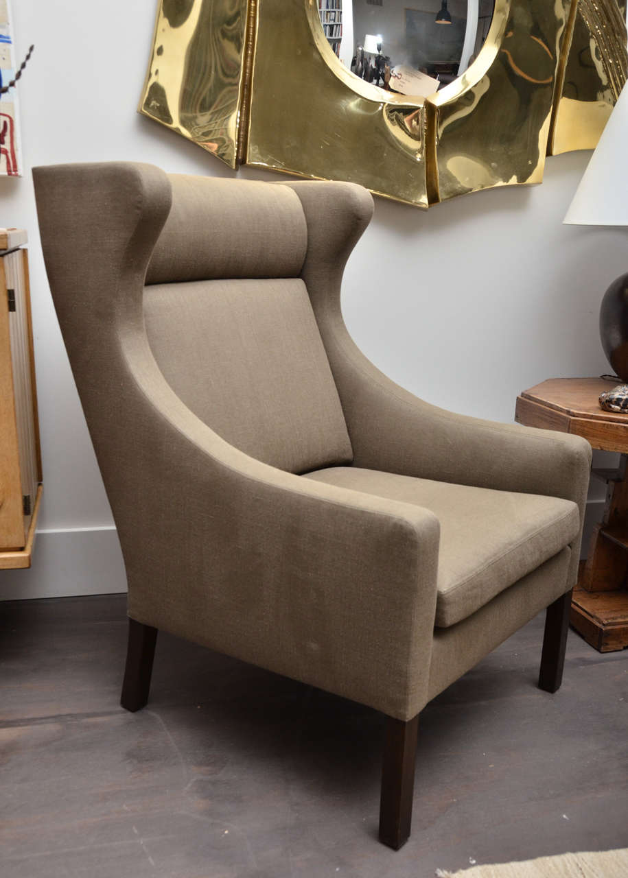 Custom upholstered Børge Mogensen style wing chair in a light brown linen. Also available as COM.