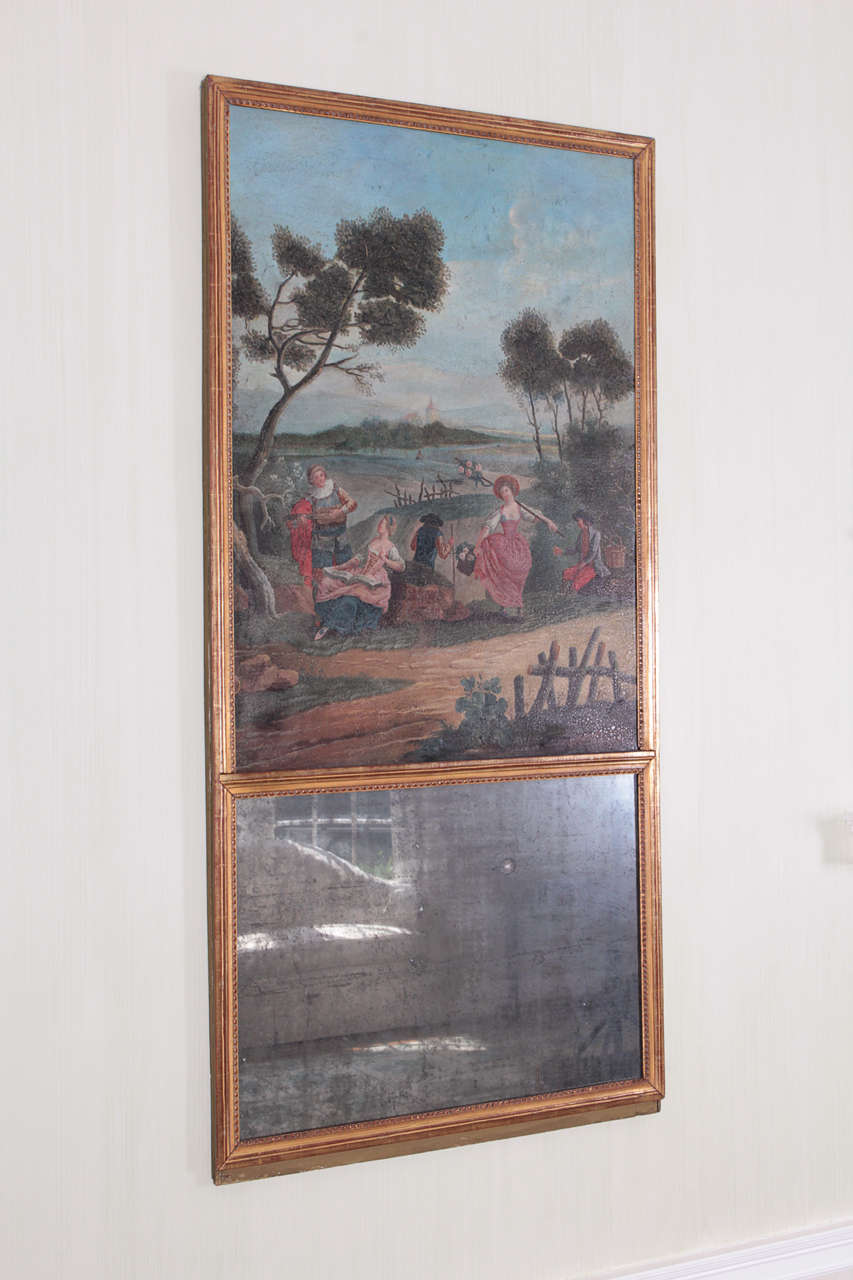 Each with canvas panel painted with figures frolicking in a bucolic landscape; the mirror plate with oxidation.