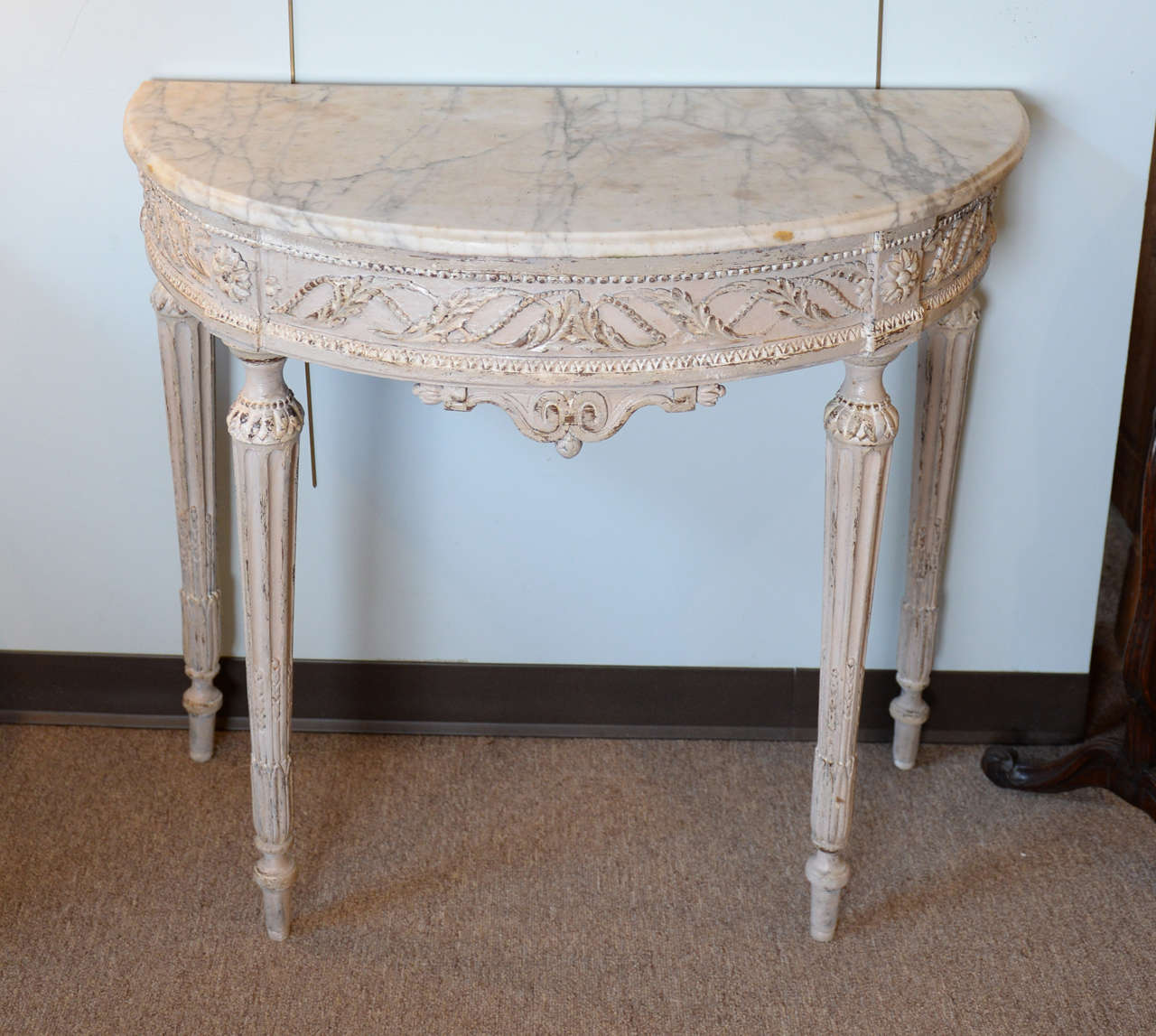 18th Century Louis XVI Style Console with Marble Top, Circa 1780
Frequently we have clients looking for small pieces for an entrance hall or other special spot.  This is a show stopper for a small space with the great carving, light color, and nice