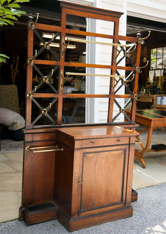 Originally found in a large home in Philadelphia, this grand hall stand held coats, hats, scarves, and canes.  Not only perfect for the foyer it can be attractive and useful for a large closet.
