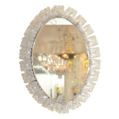 Backlit mirror with textured glass element surround by Kalmar