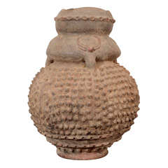 A Lobi Terra-Cotta Vessel with Knobbed Surface