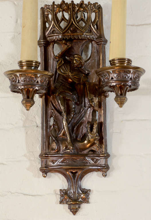 A Pair of 1920s American Gothic Revival Metal Two Branch Wall-lights