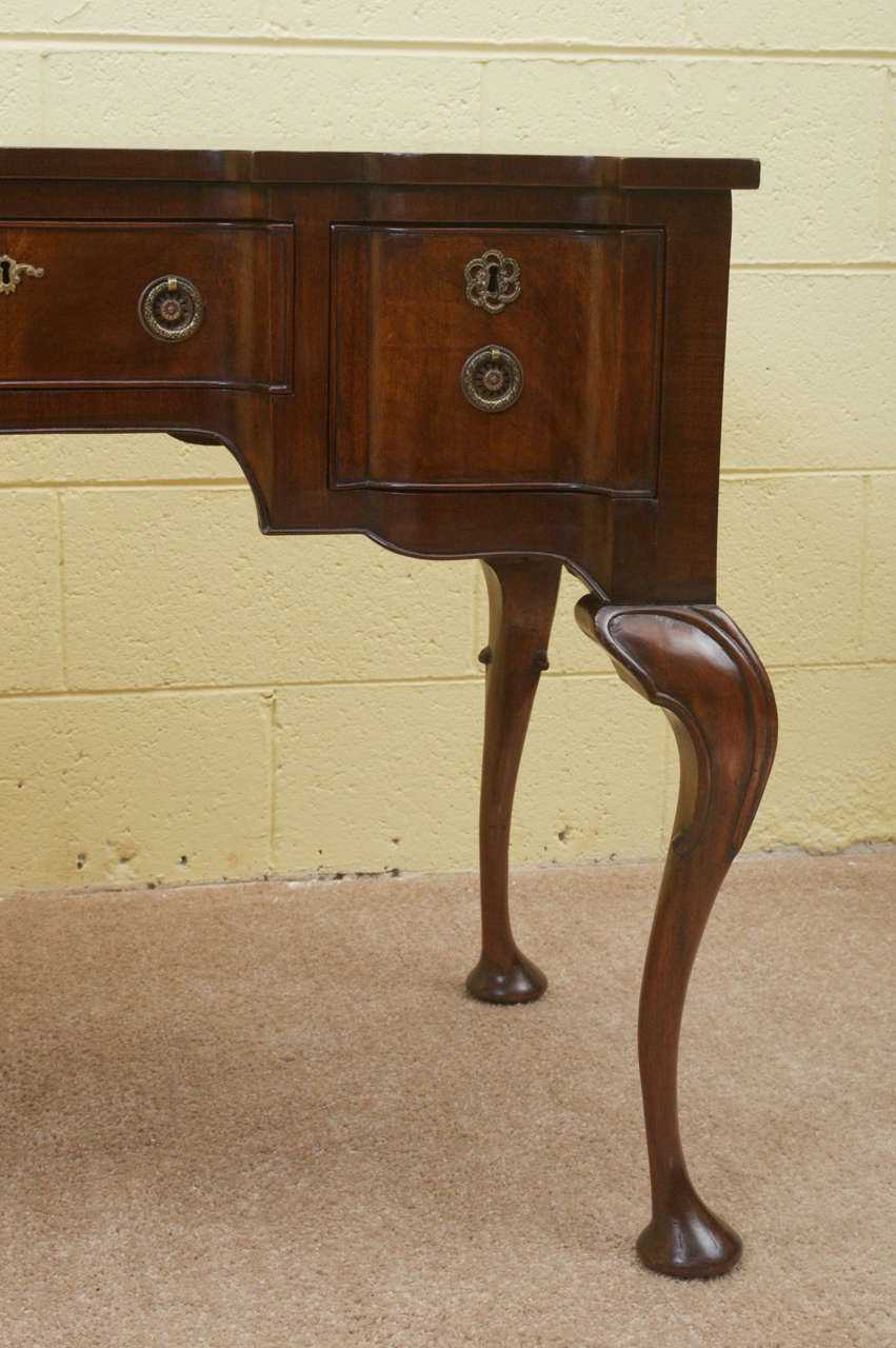 20th Century Queen Anne Style Flame Mahogany Lowboy