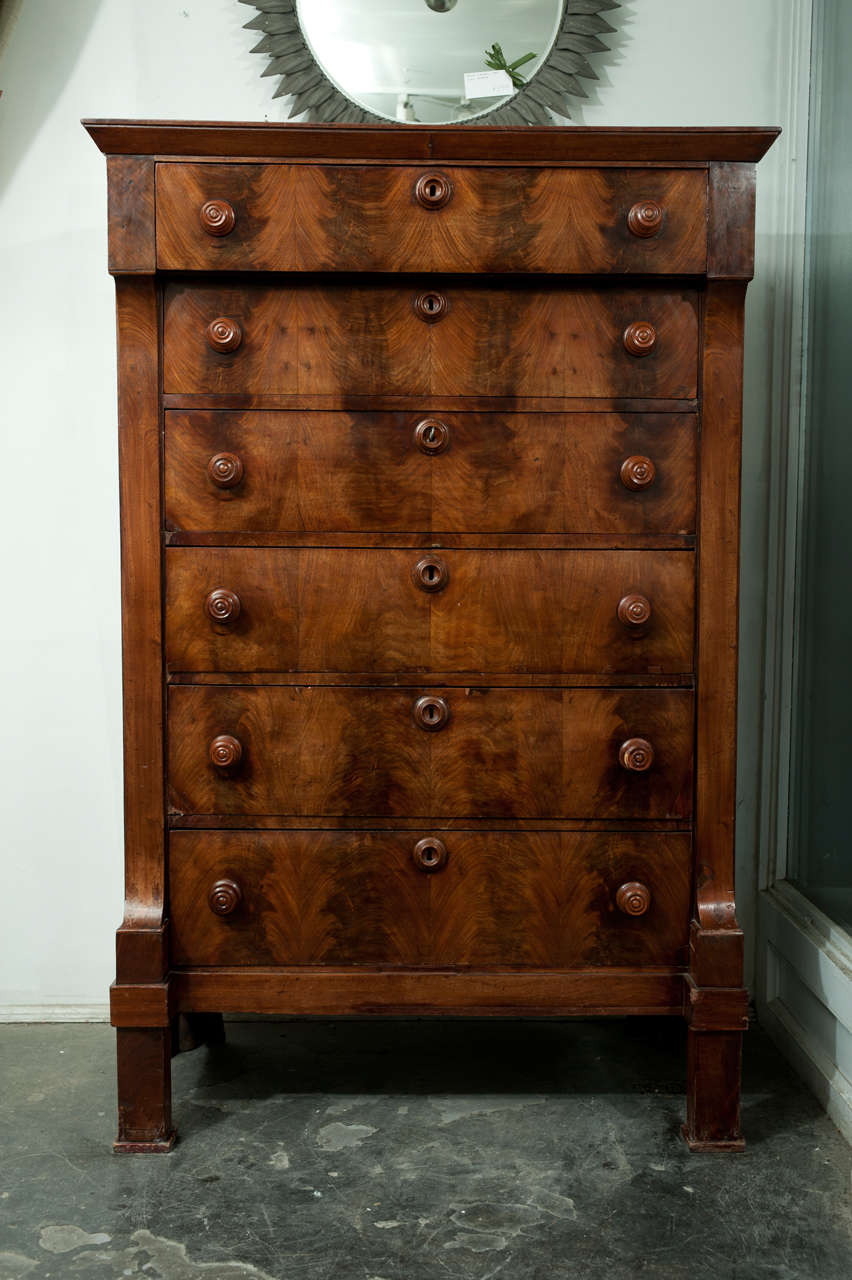 Vintage French Walnut 6 Drawer Tallboy from the 1940s. Solid walnut dresser with five 15 inch drawers and a 17 inch top drawer. Each drawer locks with one key.