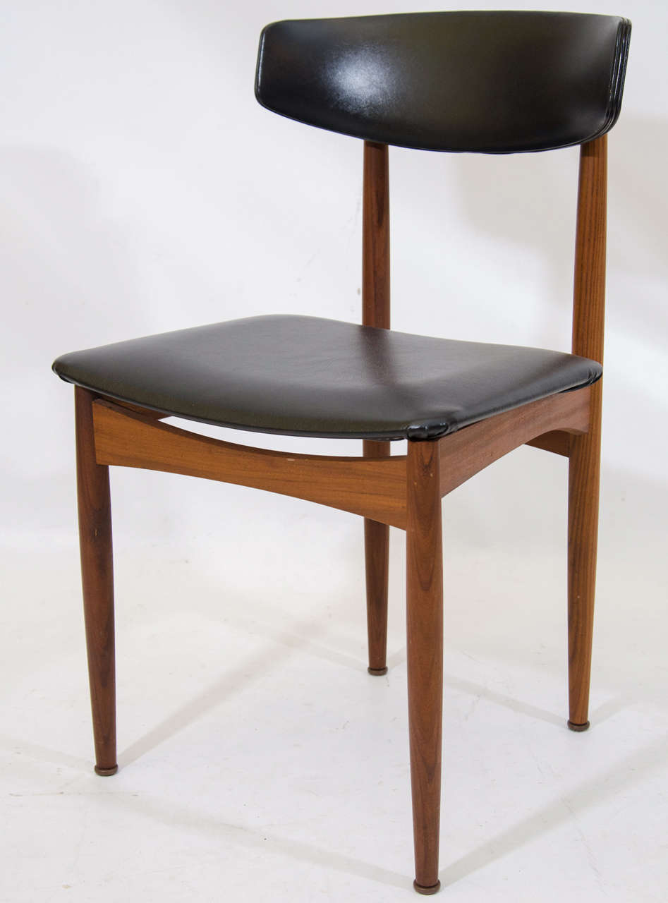 Handsome set of four Danish dining chairs. Nicely sculpted and detailed in teak. Labelled V. Schou Andersen.