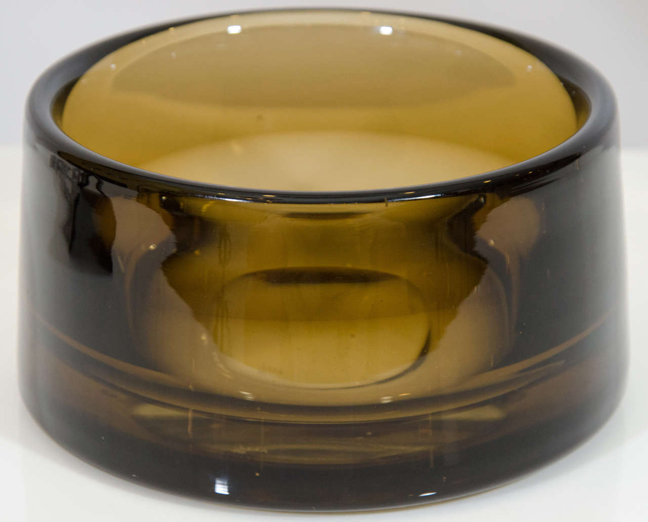 Beautiful art glass bowl in a dark smokey brown color. By Per Lutken for Holmegaard,