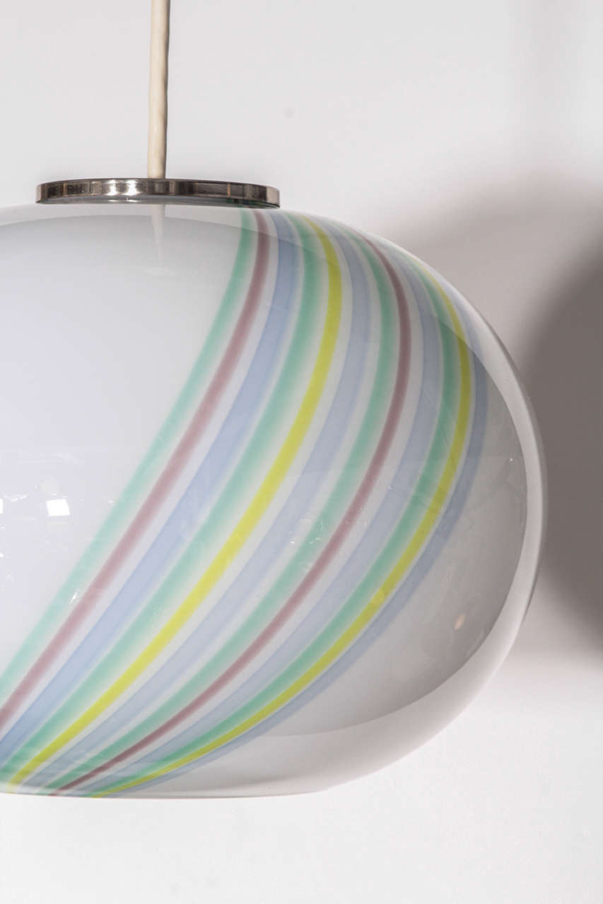 swirling glass globe pendant light