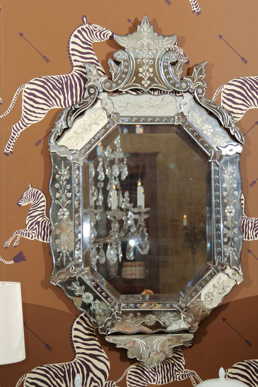 A 19th century octagonal Venitian mirror with etched and cut glass panels.