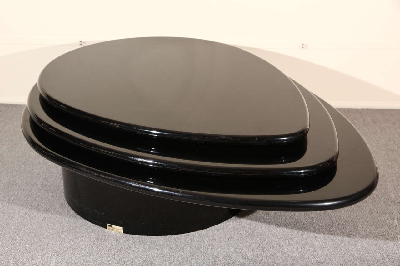 Wonderful three tiered level Black lacquered coffee table by Rougier. The table retains its original black lacquer finish which is in very good condition with minimal scratched due to age.