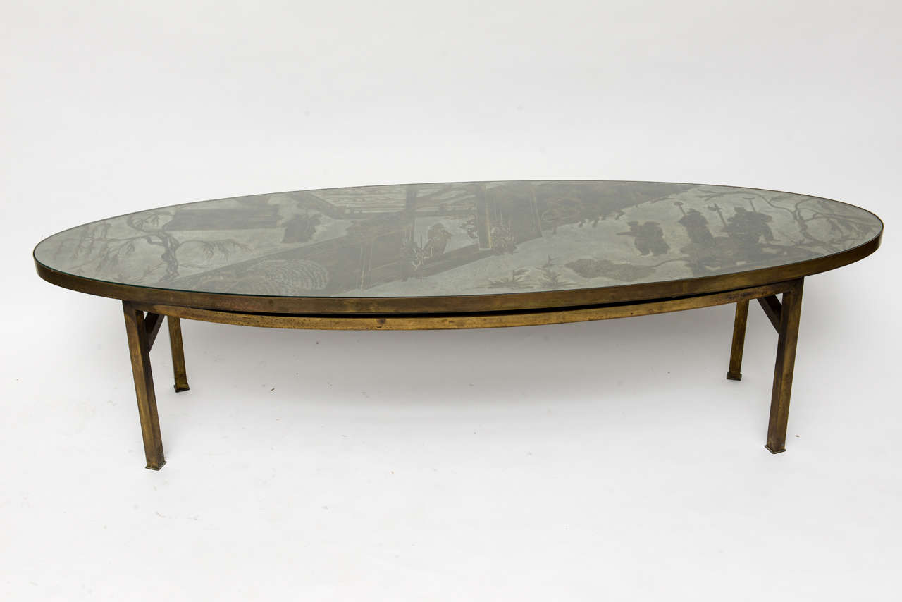 Acid-etched and patinated bronze and pewter coffee table by Philip and Kelvin LaVerne. Its surfboard shape, simple frame and etched scene that runs horizontally (rather than the more typical vertically), give this table - along with its refreshing