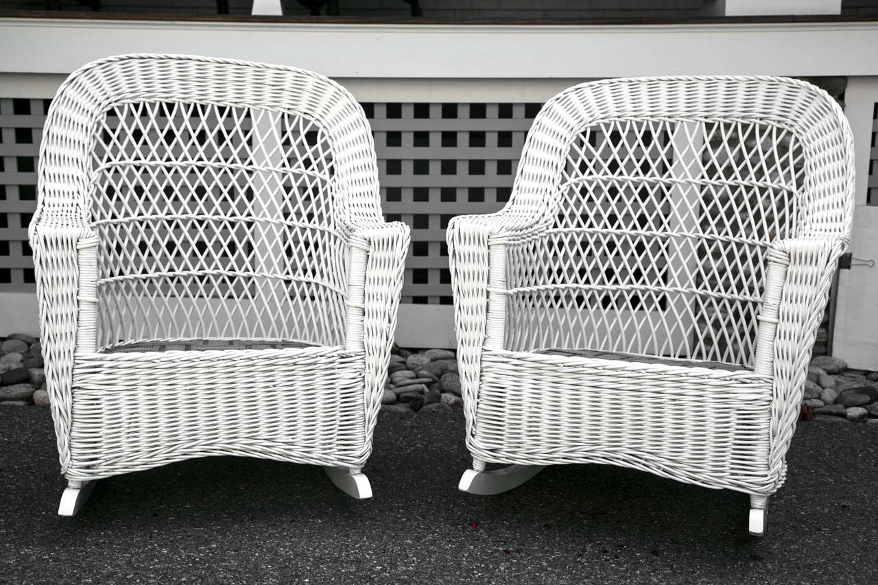 Matching Bar Harbor Wicker Rockers which coordinate with a sofa and settee listed separately.  Full skirt on all sides.