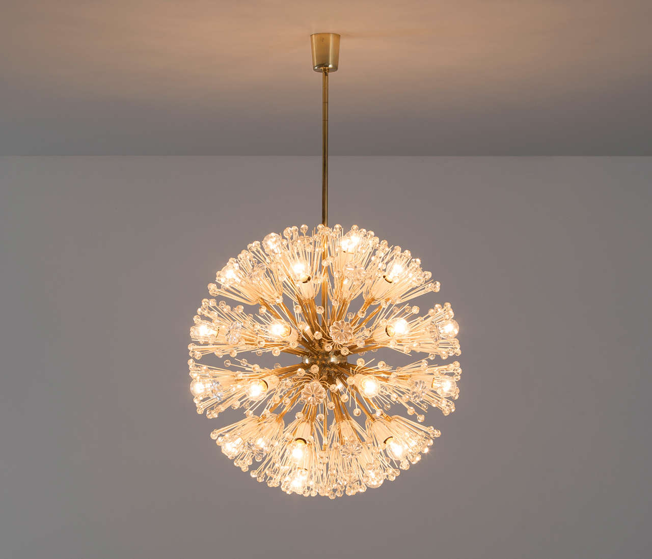 Emil Stejnar for Rupert Nikoll, sputnik chandelier, glass, crystal, brass, Austria 1950s

Large brass 'Snowball' Sputnik chandelier, made in Vienna in the 1960s. Designed by Emil Stejnar and manufactured by the famous Rupert Nikoll. This well known