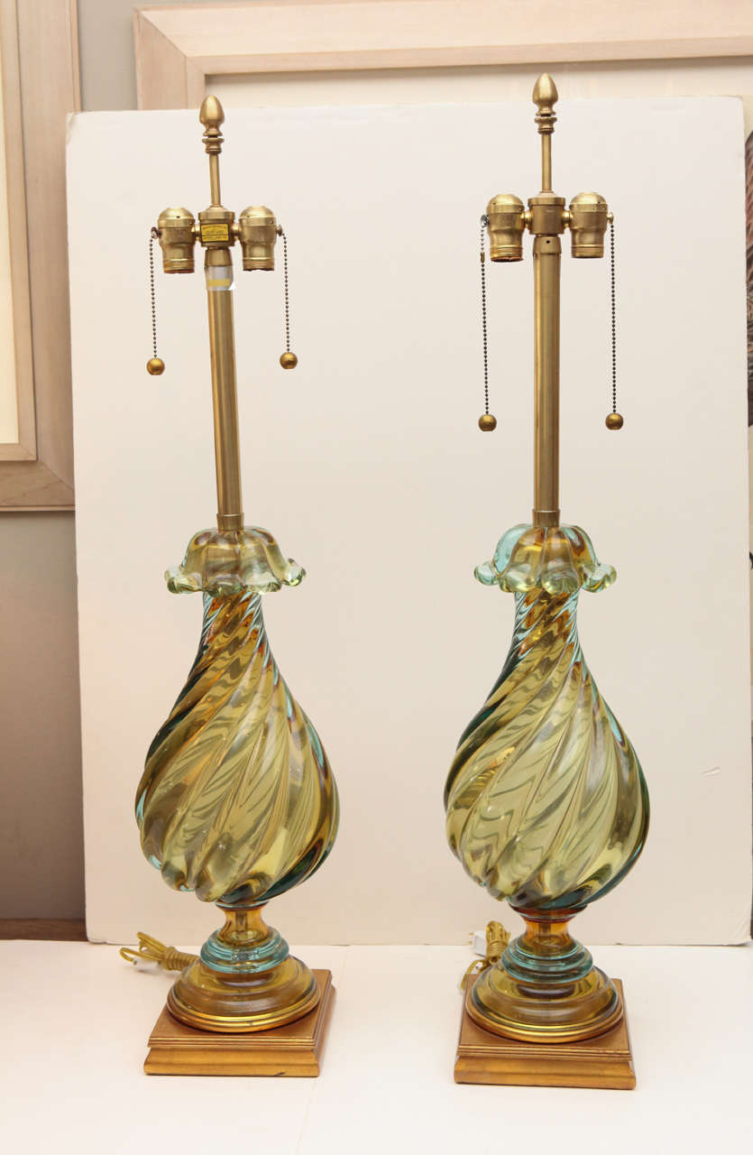 Pair of green Murano glass Marbro lamps with gilt wooden bases. Base measures 7