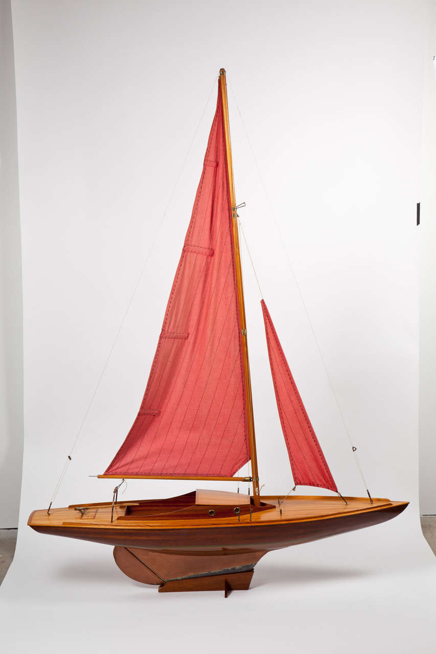Danish model of a sailboat, teak, mahogany and pine, cloth sail, circa 1940s.