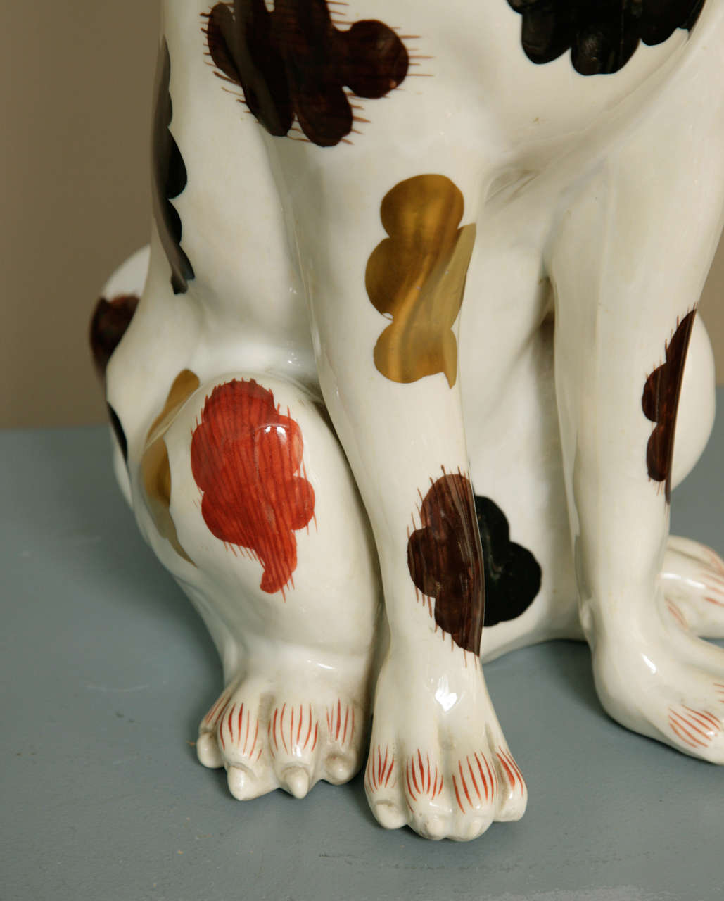 French Pair of Japanese Arita Style Continental Figures of Seated Dogs