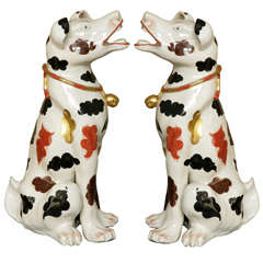 Pair of Japanese Arita Style Continental Figures of Seated Dogs