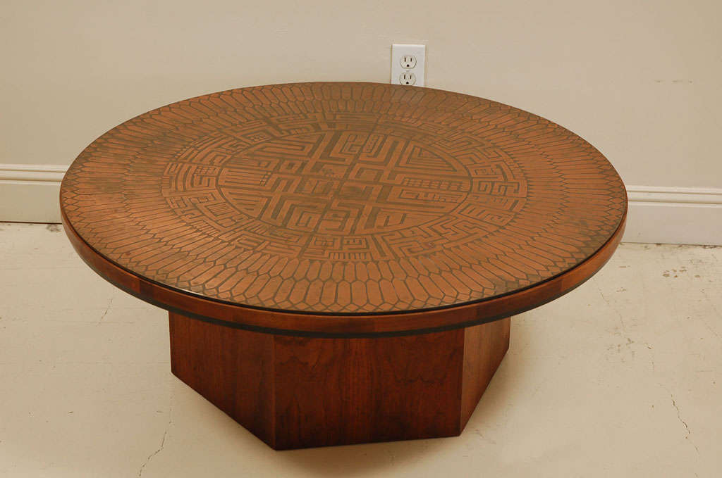 Metropolitan Group coffee table with Aztec inspired engraved copper top and walnut base.
