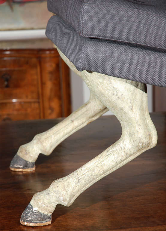 Italian carved stool with in pale green with hand-painted black and gold hoofs.