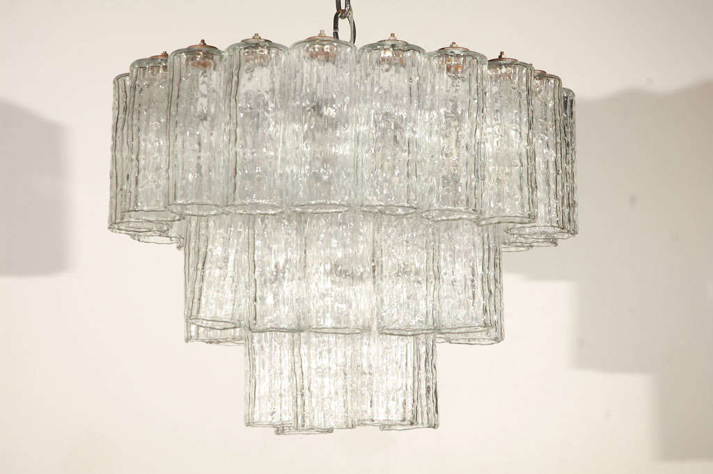 Outstanding three tiered rippled Murano glass chandelier by Venini.