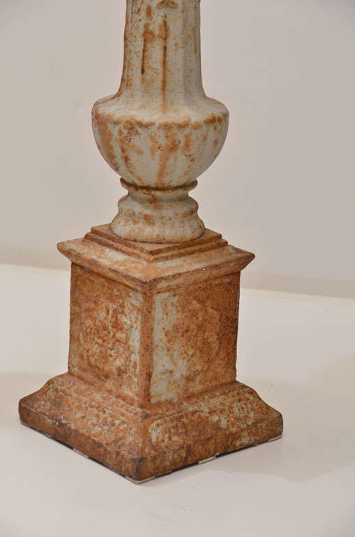 antique cast iron candle holders
