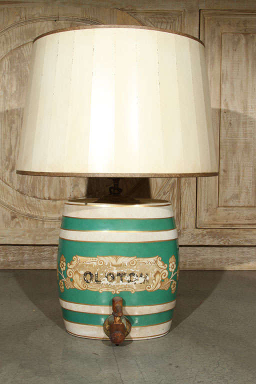 Antique jug lamp with green stripes, newly wired and new shade.