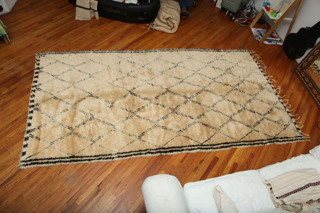 Antique Beni Ourain area rug. Morocco, circa 1920.

Measures 73 inches by 142 inches.