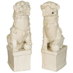 Two Large 17th Century Chinese Blanc de Chine Foo Dogs